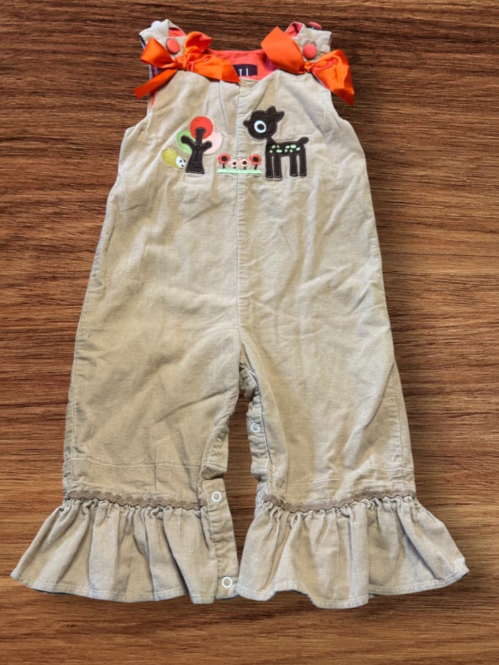 vintage-style corduroy longall romper from the children's brand Lil Cactus.